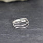 bijoux marion chappaz en argent 925 bague fine pour femme composée de trois anneaux lisse, martelé et ciselé sur ardoise
